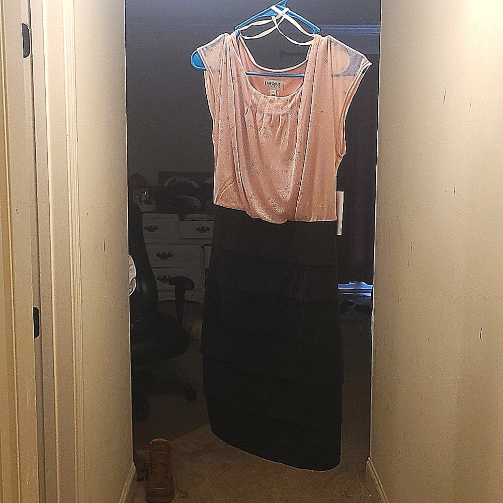 A light pink and black dress size 6